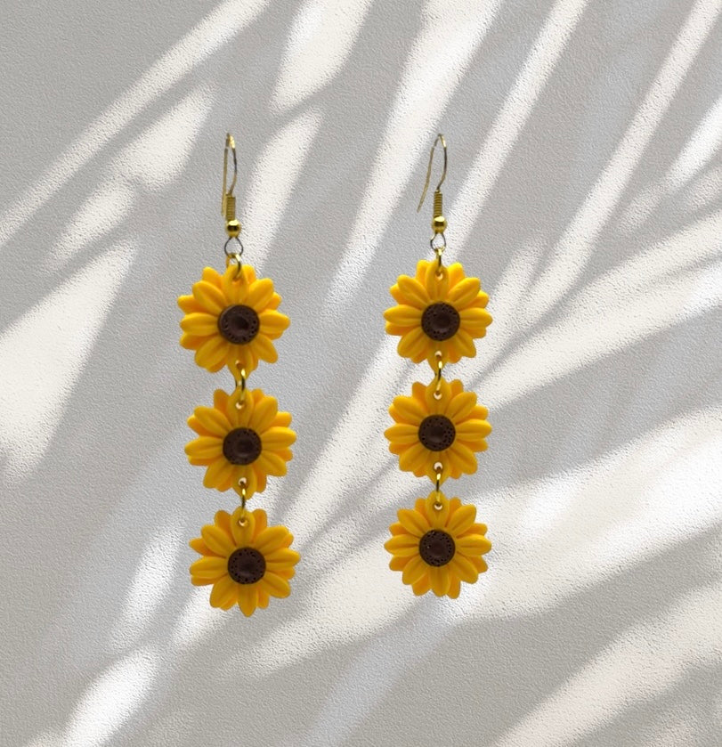 Triples girasoles